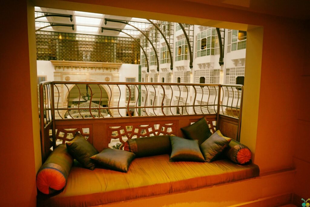 pexels-photo-167534-167534 A modern indoor balcony with cozy cushions offering a luxurious ambiance in a well-designed architectural space.